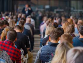 Audience listens to the lecturer